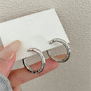 Brincos Geométricos Irregulares em Metal – Design Minimalista e Moderno para Mulher