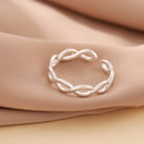 Anel Aberto em Prata 925 – Design Entrançado Oco com Detalhe Cruzado, Elegante e Ajustável